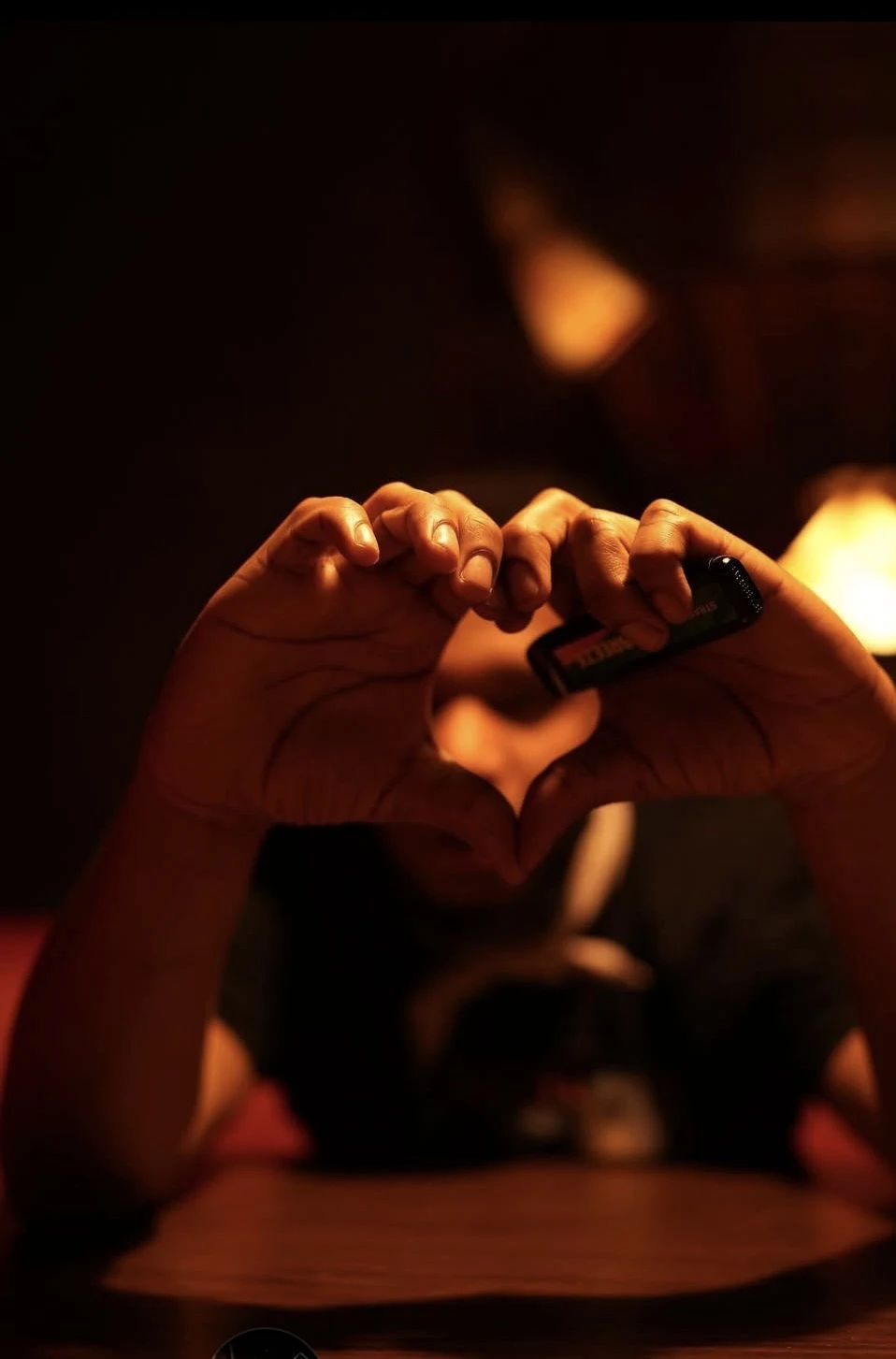 NoKissing making a heart with his hands